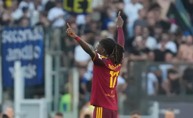 Roma's Manu Kone celebrates after scoring his side's second goal during the Series A soccer match between Roma and Inter Milan in Rome, Saturday, Sept. 19, 2026. (AP Photo/Gregorio Borgia)