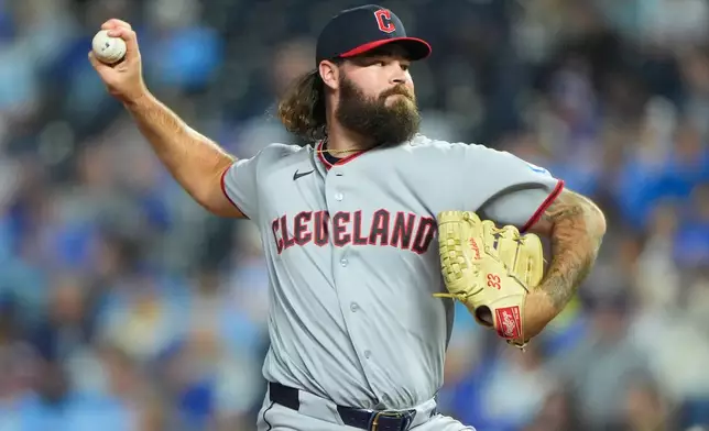 Cleveland Guardians pitcher Hunter Gaddis throws during the eighth inning of a baseball game, Friday, Sept. 25, 2026, in Kansas City, Mo. (AP Photo/Charlie Riedel)