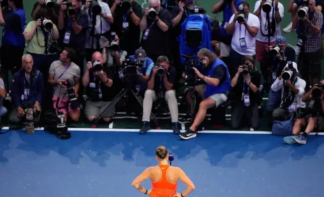 Aryna Sabalenka, of Belarus, speaks after she lost the women's singles final of the U.S. Open tennis championships against Elena Rybakina, of Kazakhstan, Saturday, Sept. 12, 2026, in New York. (AP Photo/Yuki Iwamura)