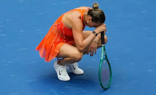 Aryna Sabalenka, of Belarus, reacts to losing a point during the women's singles final of the U.S. Open tennis championships against Elena Rybakina, of Kazakhstan, Saturday, Sept. 12, 2026, in New York. (AP Photo/Yuki Iwamura)