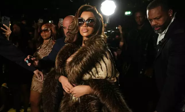 Cardi B attends the Roberto Cavalli women's Spring-Summer 2027 fashion show, in Milan, Italy, Thursday, Sept. 24, 2026. (AP Photo/Luca Bruno)
