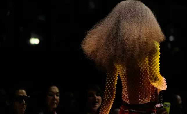 A model wears a creation part of the Roberto Cavalli women's Spring-Summer 2027 collection, presented in Milan, Italy, Thursday, Sept. 24, 2026. (AP Photo/Luca Bruno).