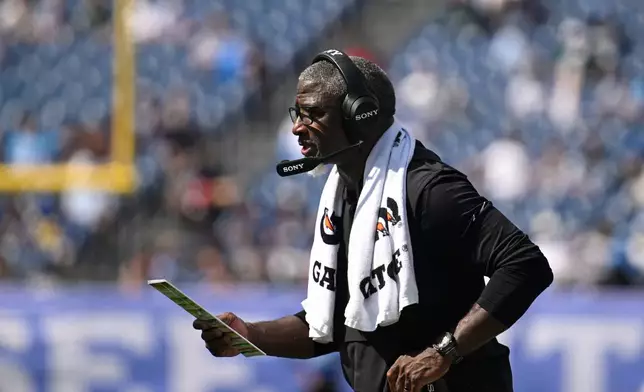 New York Jets head coach Aaron Glenn watches from the sideline during the second half of an NFL football game against the New York Jets, Sunday, Sept. 13, 2026, in Nashville, Tenn. (AP Photo/John Amis)