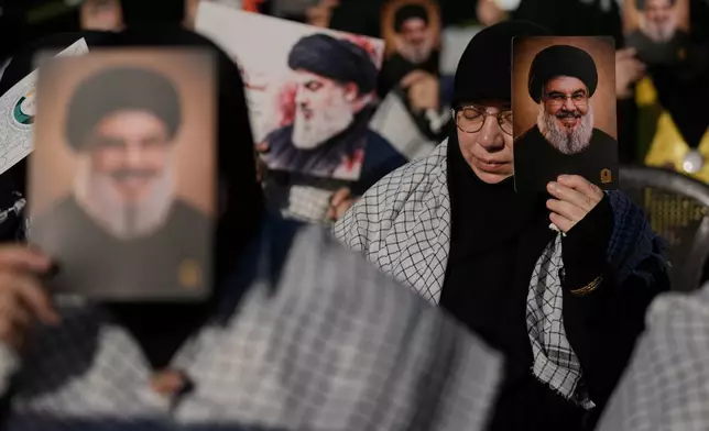 Hezbollah supporters gather to mark the second anniversary of the assassination of Hezbollah leader Hassan Nasrallah, who was killed in Israeli airstrikes, at Nasrallah's shrine in Beirut, Lebanon, Sunday, Sept. 27, 2026. (AP Photo/Bilal Hussein)
