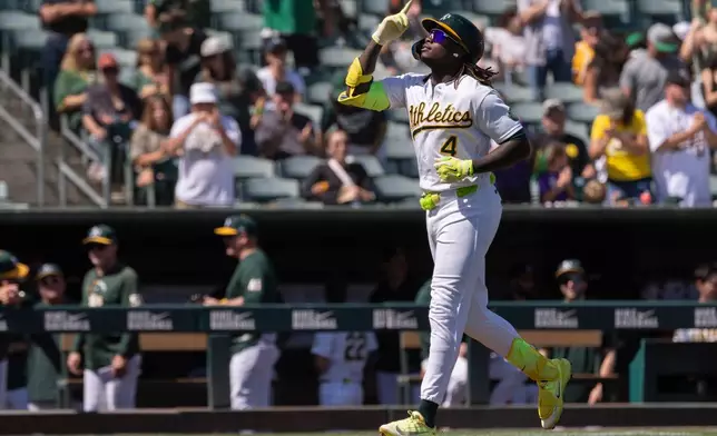 Athletics' Lawrence Butler runs the bases after after hitting a home run during the first inning of a baseball game against the Seattle Mariners, Sunday, Sept. 13, 2026, in West Sacramento, Calif. (AP Photo/Sara Nevis)