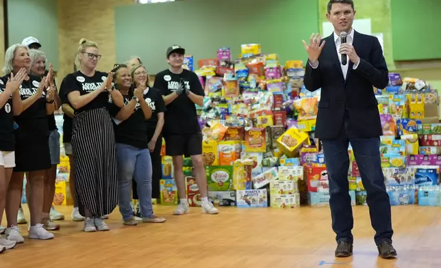 Democratic U.S. Senate candidate Texas state Rep. James Talarico speaks at a food drive at the Frederick Douglass Human Services and Justice Center, Wednesday, Sept. 9, 2026, in Dallas. (AP Photo/Julia Demaree Nikhinson)