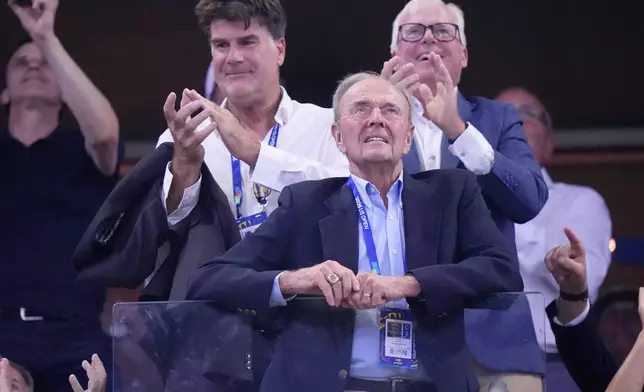 Dick Gould, a 17-time champion coach at Stanford, looks on as he is honored at the U.S. Open tennis championships, Saturday, Sept. 5, 2026, in New York. (AP Photo/Frank Franklin II)