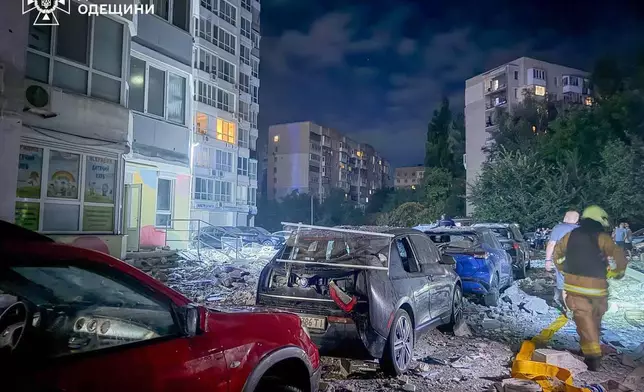 In this photo provided by the Ukrainian Emergency Service, firefighters arrive to put out a fire in a residential building after a Russian drone attack in Odesa, Ukraine, Wednesday, Sept. 2, 2026. (Ukrainian Emergency Service via AP)