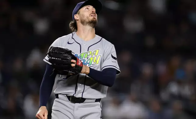 Tampa Bay Rays pitcher Mason Englert watches a solo home run by New York Yankees' Ben Rice during the first inning of a baseball game Wednesday, Sept. 23, 2026, in New York. (AP Photo/Adam Hunger)