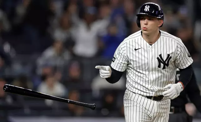 New York Yankees' Ben Rice reacts after hitting a solo home run during the first inning of a baseball game against the Tampa Bay Rays, Wednesday, Sept. 23, 2026, in New York. (AP Photo/Adam Hunger)