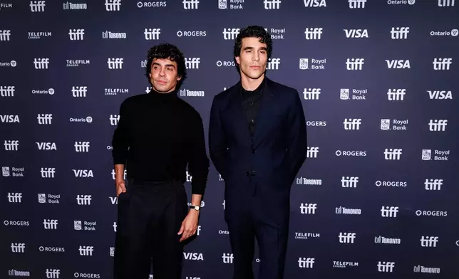 CORRECTION -Javier Ambrossi, left, and Javier Calvo is photographed on the red carpet for the film "La Bola Negra" during the Toronto International Film Festival in Toronto, on Tuesday, Sept. 15, 2026. (Keito Newman/The Canadian Press via AP) CORRECTION: Corrects to Javier Ambrossi instead of Jvier Ambroisa.