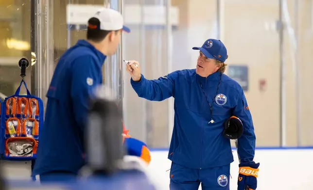 Edmonton Oilers head Coach Mike Babcock gives instruction during the NHL hockey team's training camp in Edmonton, Alberta, Thursday, Sept. 17, 2026. (John Ulan/The Canadian Press via AP)