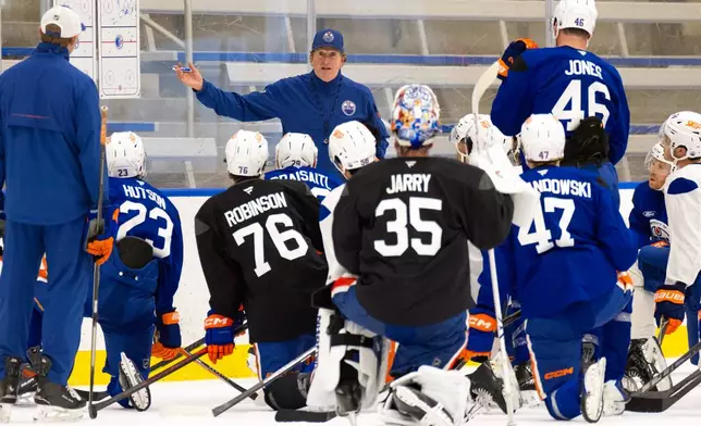 Edmonton Oilers' head coach Mike Babcock gives instruction during the NHL hockey team's training camp in Edmonton, Alberta, Thursday, Sept. 17, 2026. (John Ulan/The Canadian Press via AP)
