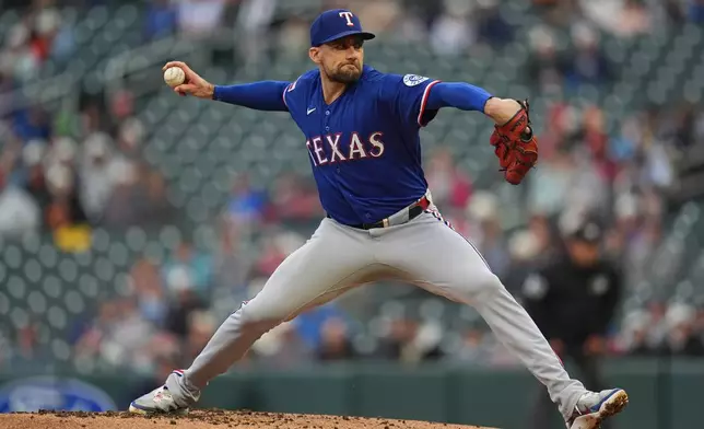 Texas Rangers starting pitcher Nathan Eovaldi delivers during the first inning of a baseball game against the Minnesota Twins, Saturday, Sept. 26, 2026, in Minneapolis. (AP Photo/Abbie Parr)