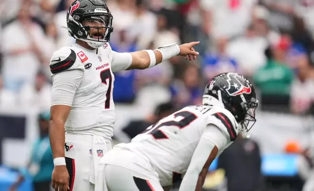 Houston Texans quarterback C.J. Stroud (7) calls the play during the second half of an NFL football game against the Buffalo Bills, Sunday, Sept. 13, 2026, in Houston. (AP Photo/Eric Christian Smith)