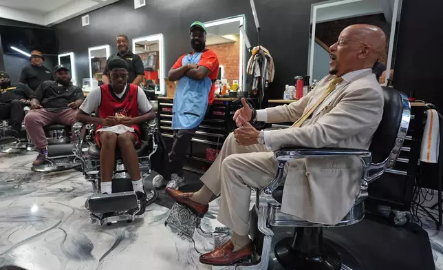 Pennsylvania State Sen. Vincent Hughes, right, speaks at Philly Cuts in Philadelphia speaks, Friday, Aug. 21, 2026, during a discussion facilitated by Win With Black Men. (AP Photo/Matt Rourke)