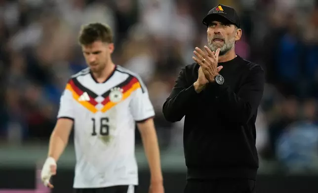 Germany's coach Jurgen Klopp walks off the pitch after the UEFA Nations League soccer match between Germany and Greece in Augsburg, Germany, Sunday, Sept. 27, 2026. (AP Photo/Matthias Schrader)
