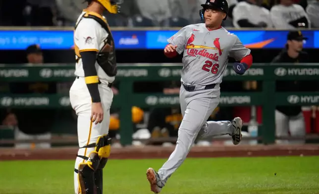St. Louis Cardinals' JJ Wetherholt (26) scores on a single by Alec Burleson off Pittsburgh Pirates pitcher Brandon Eisert during the third inning of a baseball game in Pittsburgh, Wednesday, Sept. 23, 2026. (AP Photo/Gene J. Puskar)