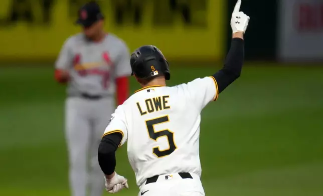 Pittsburgh Pirates' Brandon Lowe (5) rounds the bases after hitting a solo home run off St. Louis Cardinals pitcher Matthew Liberatore during the second inning of a baseball game in Pittsburgh, Wednesday, Sept. 23, 2026. (AP Photo/Gene J. Puskar)
