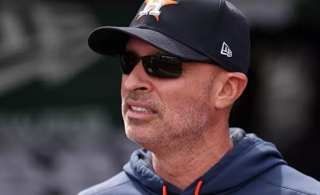 Houston Astros manager Joe Espada looks to the field before a baseball game against the Athletics, Sunday, Sept. 27, 2026, in West Sacramento, Calif. (AP Photo/Sara Nevis)
