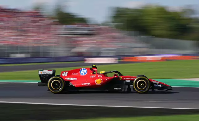 Ferrari driver Lewis Hamilton of Britain steers his car during the Italian Formula One Grand Prix race, in Monza, Italy, Sunday, Sept. 6, 2026. (AP Photo/Antonio Calanni)