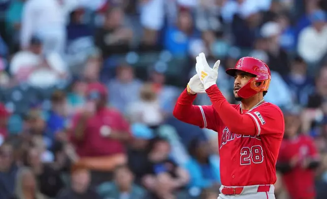 Los Angeles Angels' Jose Siri reacts while jogging the bases after hitting a two-run home run against the Seattle Mariners during the eighth inning of a baseball game, Sunday, Sept. 27, 2026, in Seattle. (AP Photo/Lindsey Wasson)