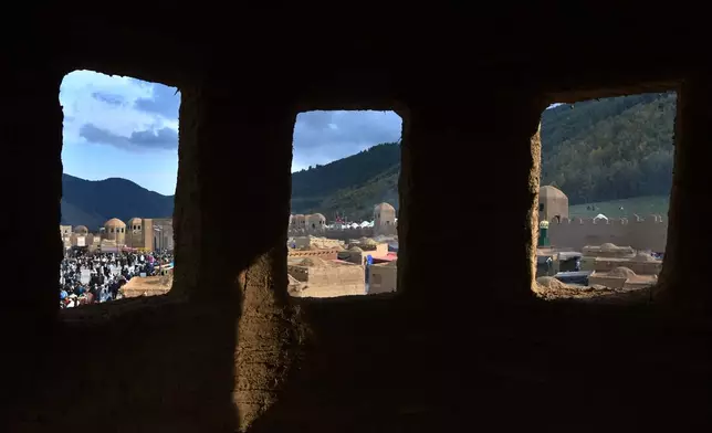 The semblance of a medieval nomadic fortress is seen through tower windows at the World Nomad Games in Kyrchyn Gorge, Kyrgyzstan, Thursday, Sept. 3, 2026. (AP Photo/Vladimir Voronin)