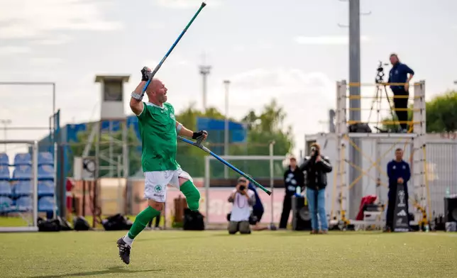 Panathinaikos' Lazaros Marigkos celebrates scoring during an amputee soccer match between FCSB and Panathinaikos in the inaugural EAFF Conference League in Bucharest, Romania, Friday, Sept. 25, 2026. (AP Photo/Andreea Alexandru)