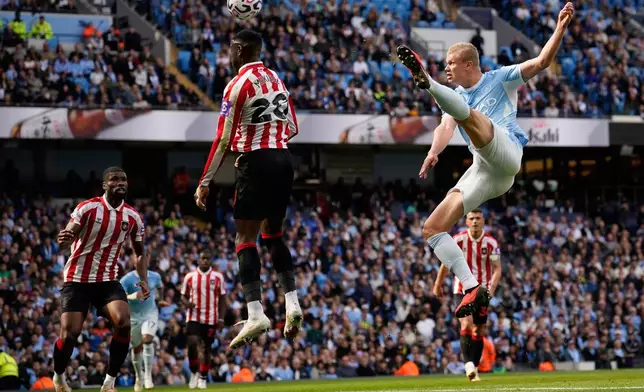 Manchester City's Erling Haaland shoots during the English Premier League soccer match between Manchester City and Sunderland in Manchester, England, Sunday, Sept. 20, 2026. (AP Photo/Dave Thompson)