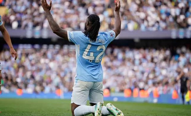 Manchester City's Antoine Semenyo reacts after scoring third goal during the English Premier League soccer match between Manchester City and Sunderland in Manchester, England, Sunday, Sept. 20, 2026. (AP Photo/Dave Thompson)