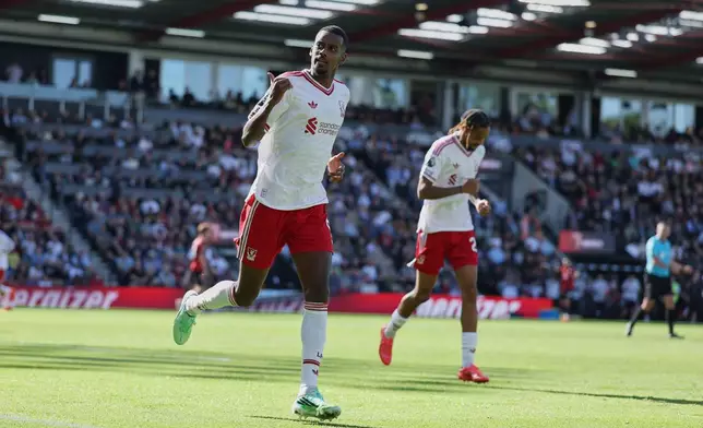Liverpool's Alexander Isak, celebrates after scoring his side opening goal during the English Premier League soccer match between Bournemouth and Liverpool in Bournemouth, England, Sunday, Sept. 20, 2026. (AP Photo/Ian Walton)