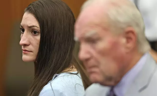 Lindsay Clancy and attorney Kevin Reddington watch as Judge William Sullivan tells the jury to keep discussing a possible verdict after jurors said for a second time they couldn't agree whether Lindsay Clancy was criminally responsible for killing her three children in 2023, Wednesday, Sept. 2, 2026, in Plymouth, Mass. (Greg Derr/The Patriot Ledger via AP, Pool)
