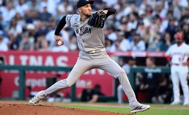 New York Yankees pitcher Elmer Rodriguez throws against the Los Angeles Angels in the first inning of a baseball game Monday, Aug. 31, 2026, in Anaheim, Calif. (AP Photo/Wally Skalij)