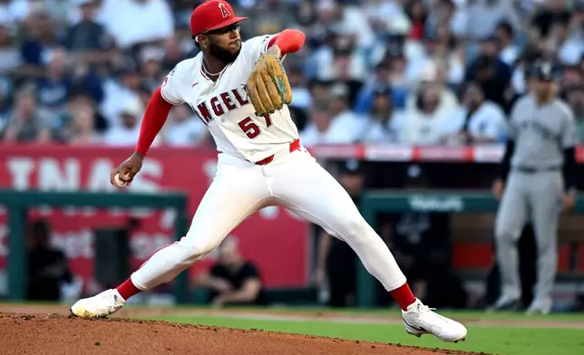 Los Angeles Angels pitcher Walbert Urena throws against the New York Yankees in the second inning of a baseball game Monday, Aug. 31, 2026, in Anaheim, Calif. (AP Photo/Wally Skalij)
