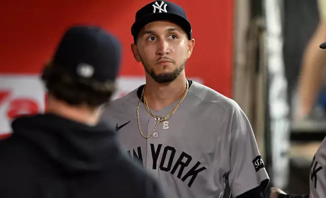 New York Yankees pitcher Elmer Rodriguez comes out of a baseball game against the Los Angeles Angels in the fourth inning Monday, Aug. 31, 2026, in Anaheim, Calif. (AP Photo/Wally Skalij)