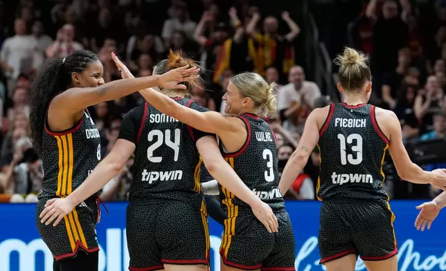 German players react during the Women's Basketball World Cup quarterfinal match between Germany and Belgium in Berlin, Thursday, Sept. 10, 2026. (AP Photo/Ebrahim Noroozi)