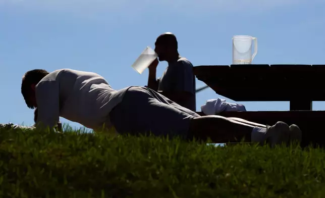 People who are incarcerated exercise and drink water at the Minnesota Correctional Facility in Lino Lakes, Minn., Tuesday, Sept. 15, 2026. (AP Photo/Ellen Schmidt)
