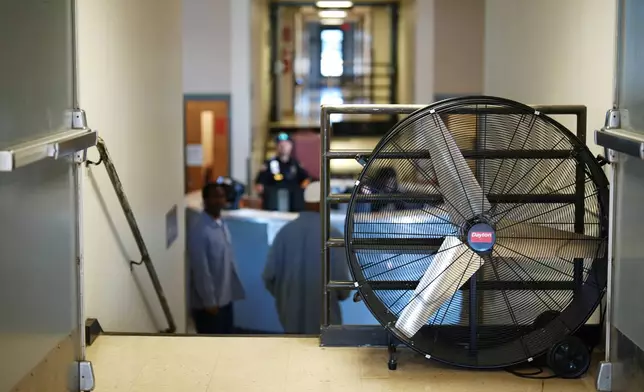 An industrial fan sits in a housing unit at the Minnesota Correctional Facility in Lino Lakes, Minn., Tuesday, Sept. 15, 2026. (AP Photo/Ellen Schmidt)