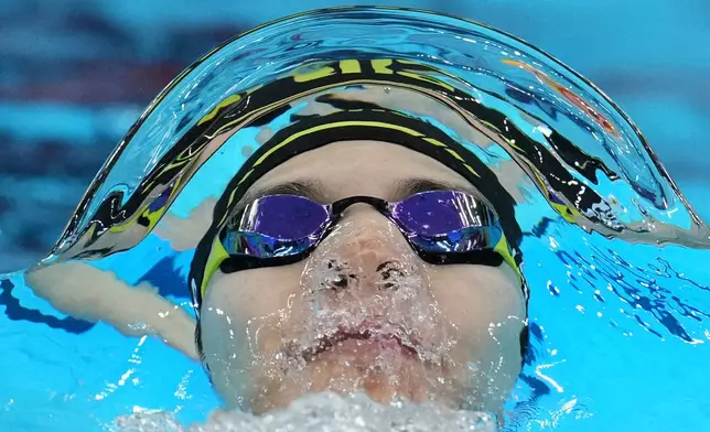 Lee Ju-ho of South Korea swims in the men's 200m backstroke swimming final at the Asian Games in Tokyo, Japan, Friday, Sept. 25, 2026. (AP Photo/Hiro Komae)
