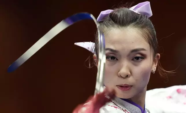 Malaysia' Mandy Cebelle Chen competes in the women's Wushu taijijan final at the Asian Games in Nagoya, Japan, Sunday, Sept. 20, 2026. (AP Photo/Mark Baker)