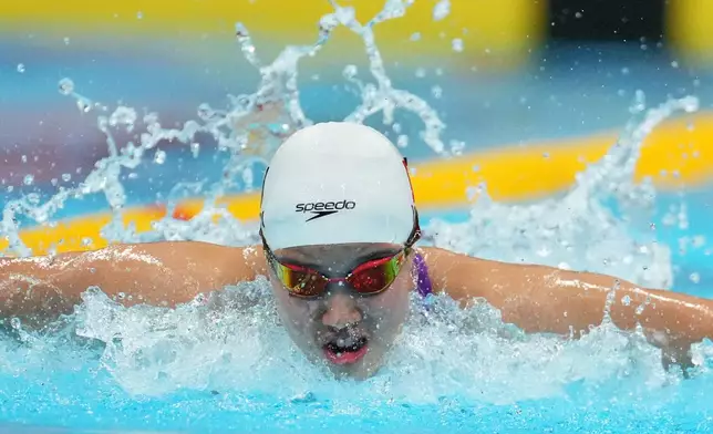 Yu Zidi of China competes in the women's 200-meter individual medley final in swimming at the Asian Games in Tokyo, Japan, Monday, Sept. 21, 2026. (AP Photo/Hiro Komae)