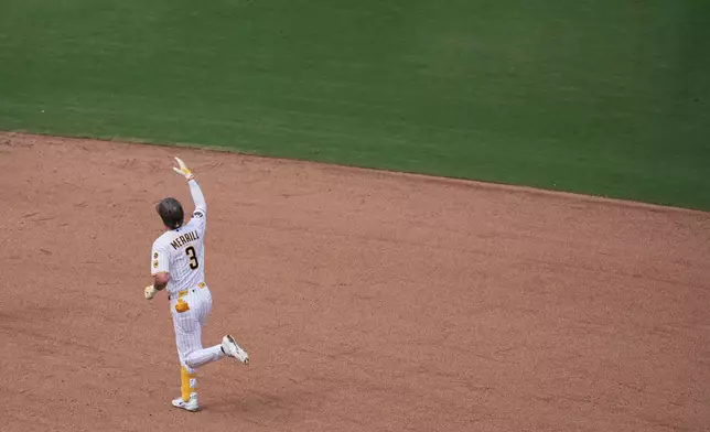 San Diego Padres' Jackson Merrill celebrates after hitting a two-run home run during the fifth inning of a baseball game against the Washington Nationals Wednesday, Sept. 9, 2026, in San Diego. (AP Photo/Gregory Bull)