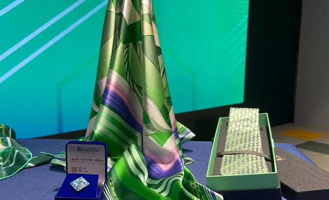 It was the second time that THEi has designed the ties and scarves for the Chief Executive and his team. Photo by Bastille Post