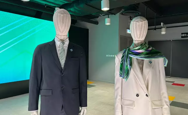 It was the second time that THEi has designed the ties and scarves for the Chief Executive and his team. Photo by Bastille Post