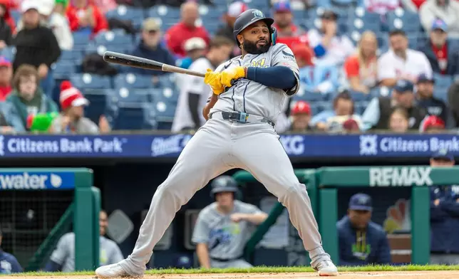 Tampa Bay Rays' Junior Caminero dodges an inside pitch during the first inning of a baseball game against the Philadelphia Phillies, Sunday, Sept. 27, 2026, in Philadelphia. (AP Photo/Laurence Kesterson)