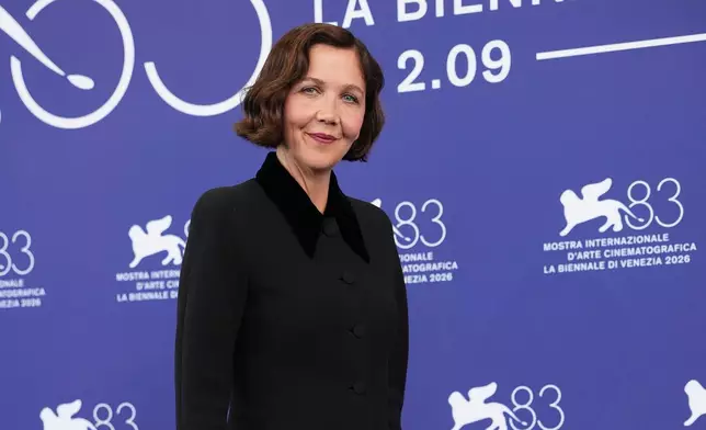 Jury president Maggie Gyllenhaal poses for photographers at the jury photo call during the 83rd edition of the Venice Film Festival in Venice, Italy, on Wednesday, Sept. 2, 2026. (Photo by Scott A Garfitt/Invision/AP)