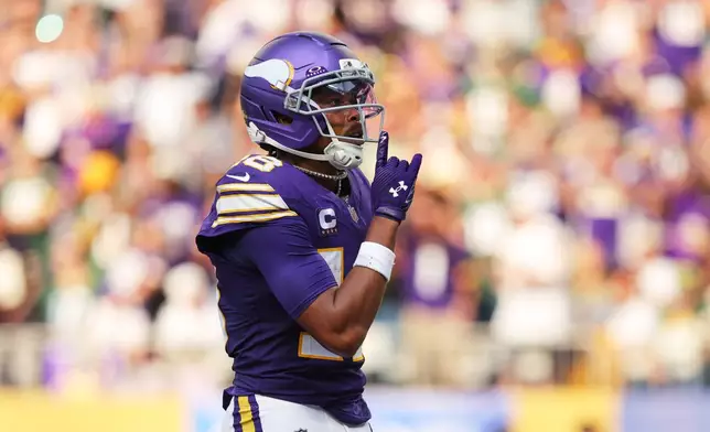 Minnesota Vikings wide receiver Justin Jefferson. Celebrates his touchdown catch during the first half of an NFL football game against the Green Bay Packers, Sunday, Sept. 13, 2026, in Minneapolis, Minn. (AP Photo/Bailey Hillesheim)