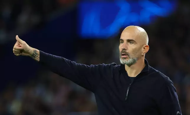 Manchester City's head coach Enzo Maresca gestures during a Champions League opening phase soccer match between FC Porto and Manchester City in Porto, Portugal, Tuesday, Sept. 8, 2026. (AP Photo/Luis Vieira)