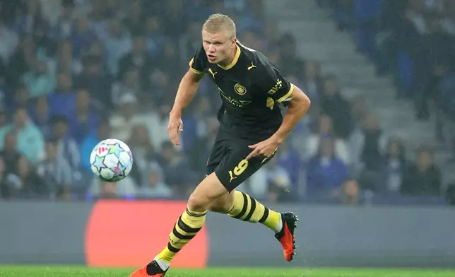 Manchester City's Erling Haaland runs after the ball during a Champions League opening phase soccer match between FC Porto and Manchester City in Porto, Portugal, Tuesday, Sept. 8, 2026. (AP Photo/Luis Vieira)