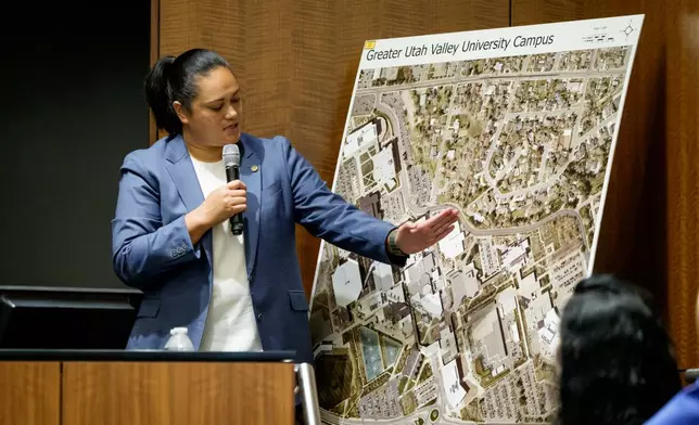 FILE - Sgt. Jennifer Faumuina, of the Utah Department of Public Safety, motions toward a map of the Utah Valley University campus during a preliminary hearing for Tyler Robinson, who is accused in the fatal shooting of Charlie Kirk, at the Fourth District Courthouse in Provo, Utah, July 9, 2026. (AP Photo/Spenser Heaps, Pool, File)